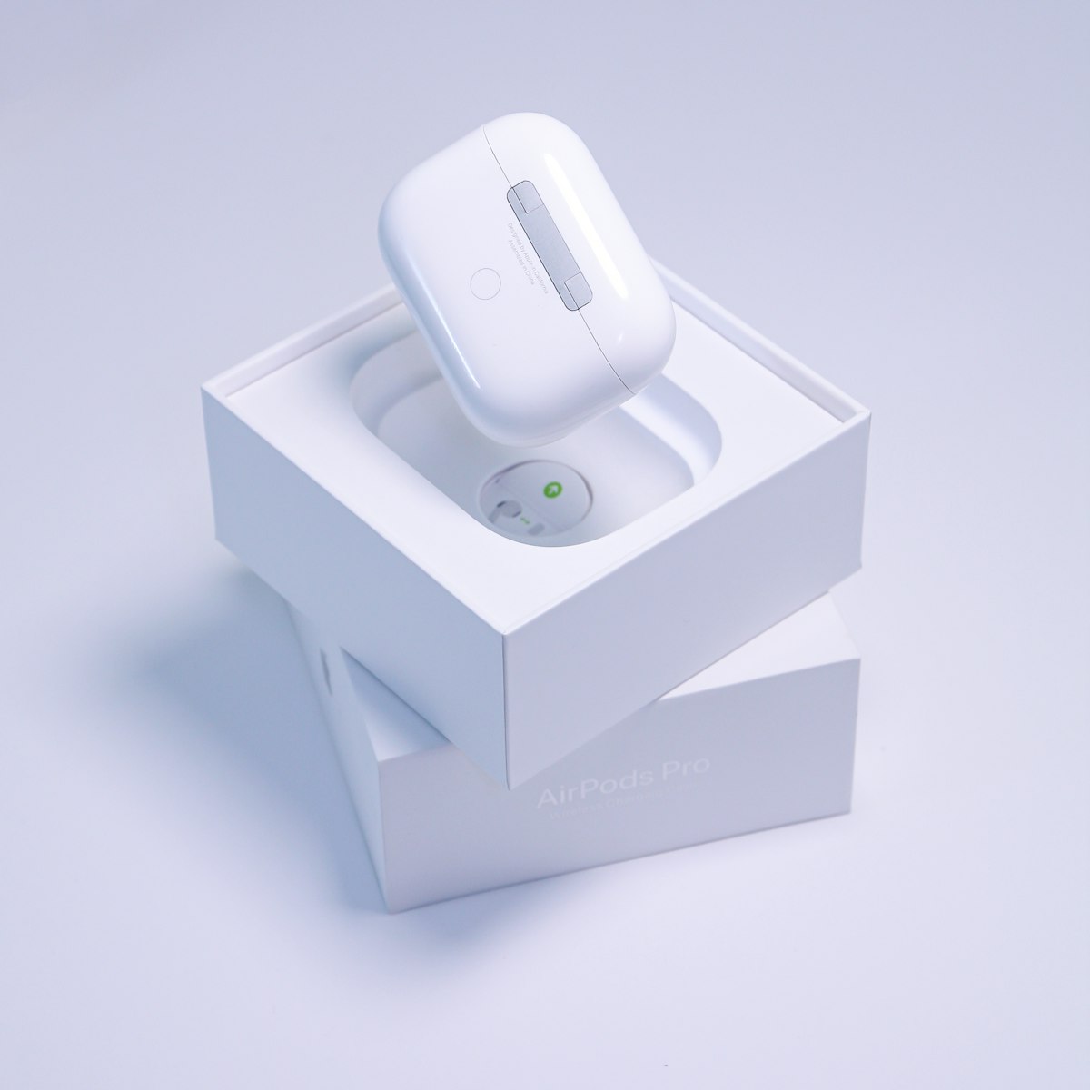 AirPods Pro 3 case on its retail box, white background